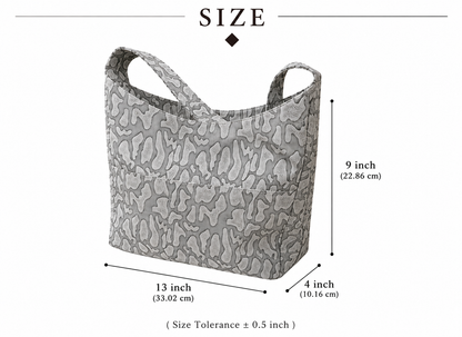 The Elegant Grey Textured Tote Bag is designed for women who appreciate both style and functionality.